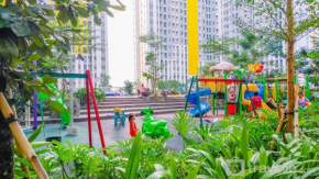Modern Studio with Great Lake View at Springlake Summarecon Apartment By Travelio